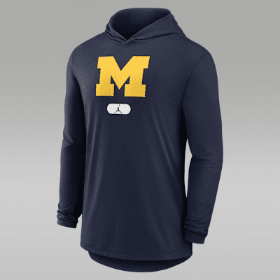 Michigan Wolverines Men s Jordan Brand Dri FIT College Long Sleeve Hooded T Shirt. Nike